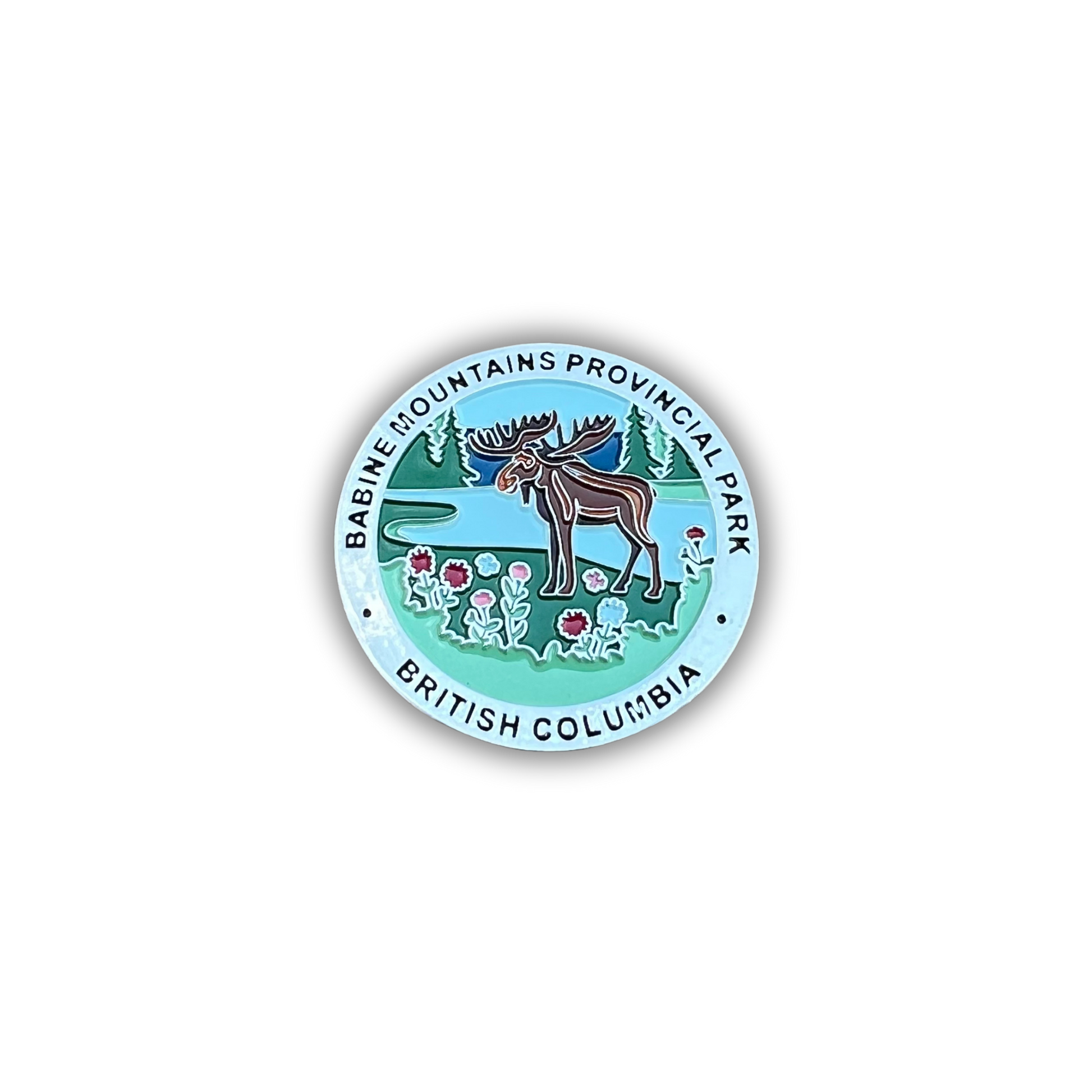 A circular enamel-style sticker or pin featuring the Babine Mountains Provincial Park logo from British Columbia, with a moose, trees, flowers, and light blue border text.