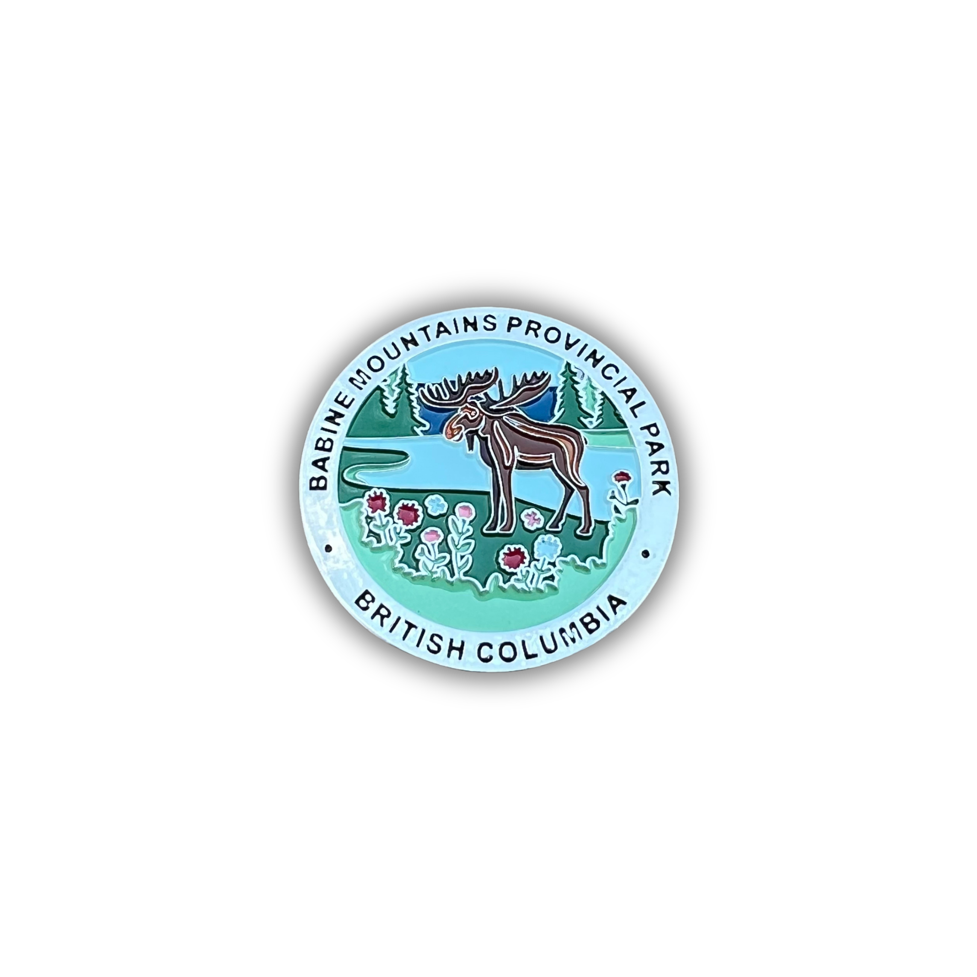 A circular enamel-style sticker or pin featuring the Babine Mountains Provincial Park logo from British Columbia, with a moose, trees, flowers, and light blue border text.