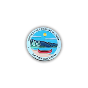 A circular enamel-style sticker or pin featuring a landscape illustration of Cultus Lake Provincial Park in British Columbia, with a red canoe, blue sky, mountains, trees, and the text 'CULTUS LAKE PROVINCIAL PARK' and 'BRITISH COLUMBIA'.