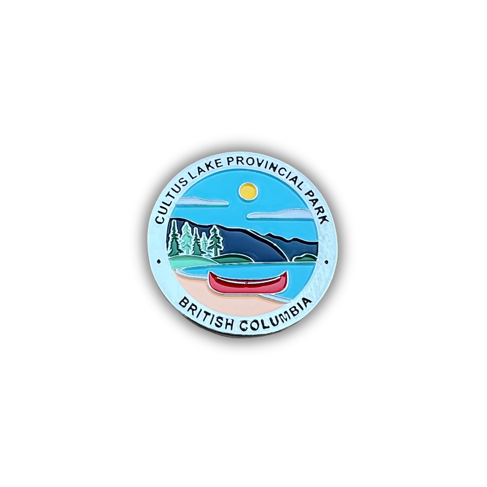 A circular enamel-style sticker or pin featuring a landscape illustration of Cultus Lake Provincial Park in British Columbia, with a red canoe, blue sky, mountains, trees, and the text 'CULTUS LAKE PROVINCIAL PARK' and 'BRITISH COLUMBIA'.