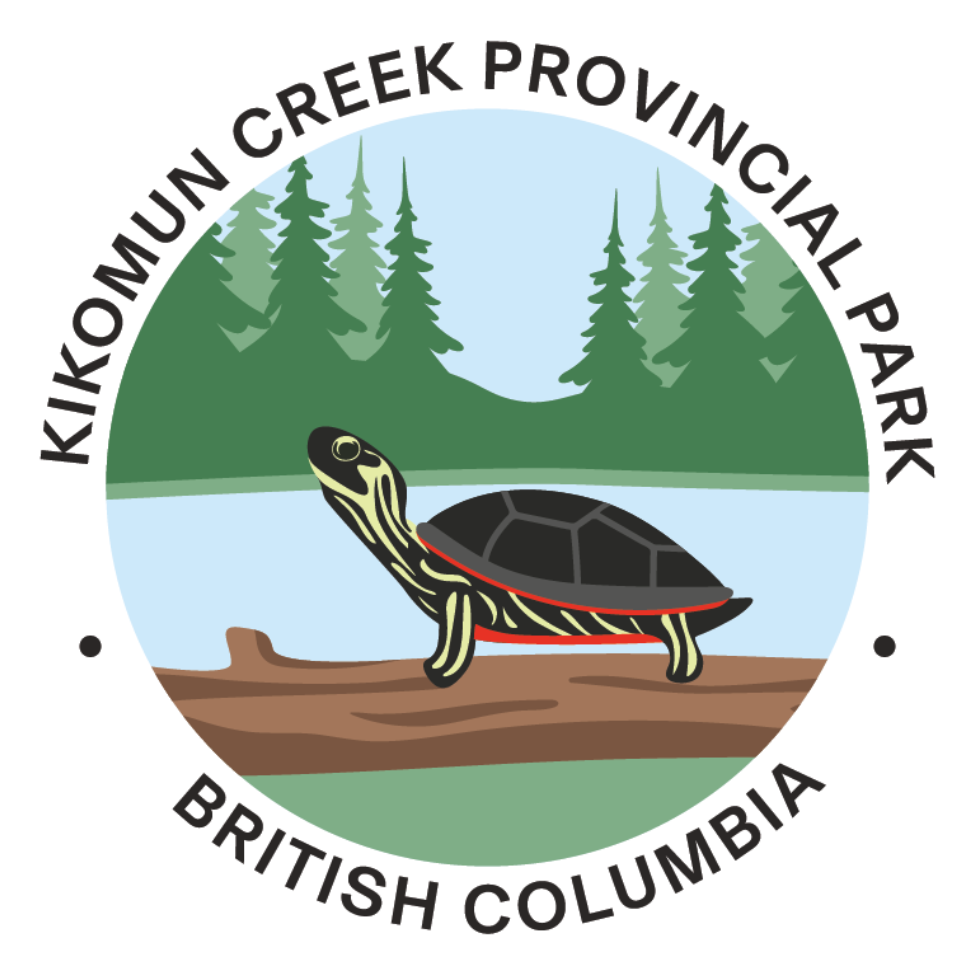 Logo of Kikomun Creek Provincial Park in British Columbia featuring a turtle on a log with trees in the background.