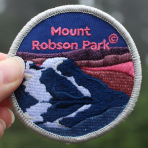 BC Parks Foundation Mount Robson Park patch held up outside